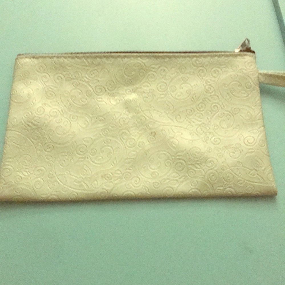 A mint green pouch